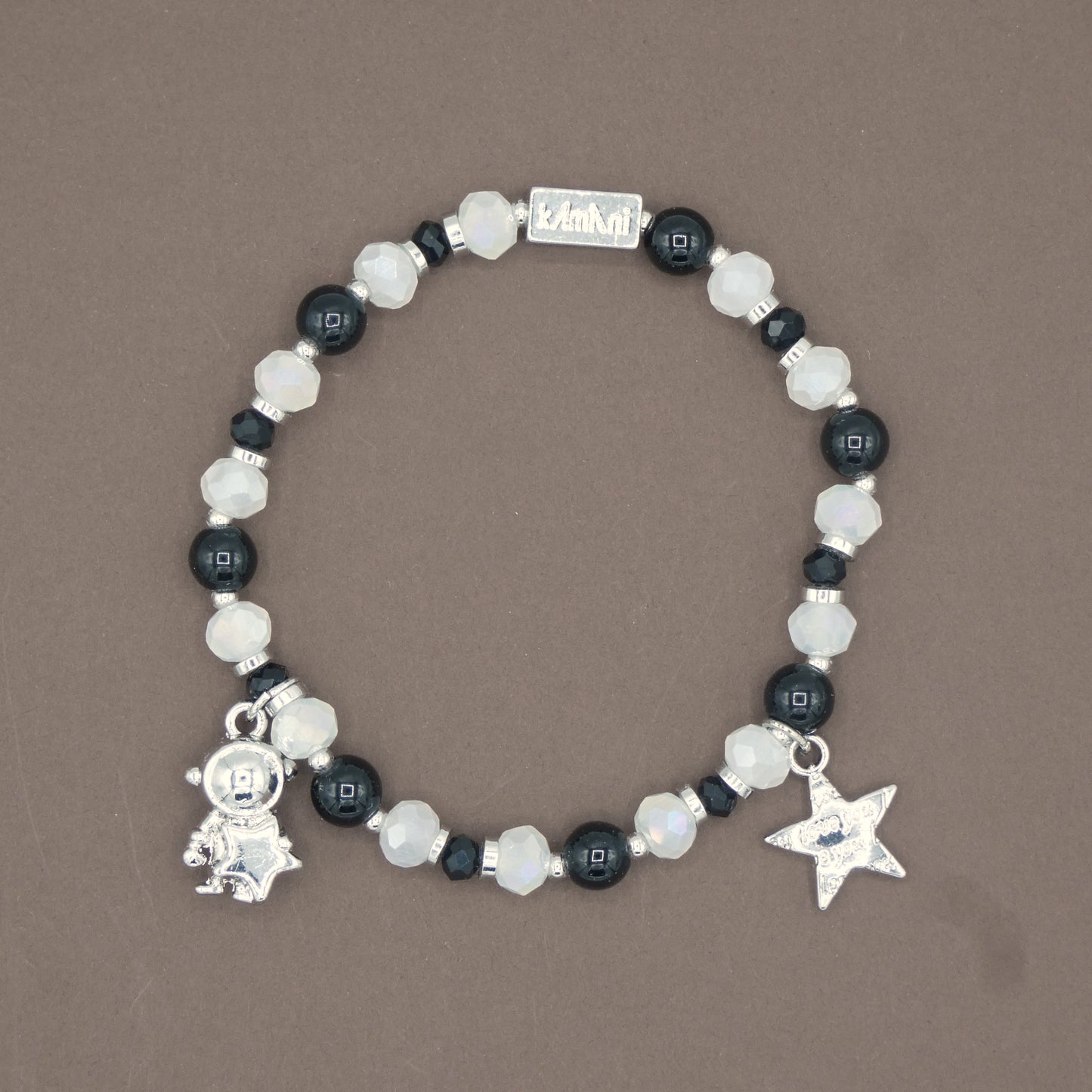 Bracelet avec Charms " Astronaute " Collection Noir des Taureaux Camarguais