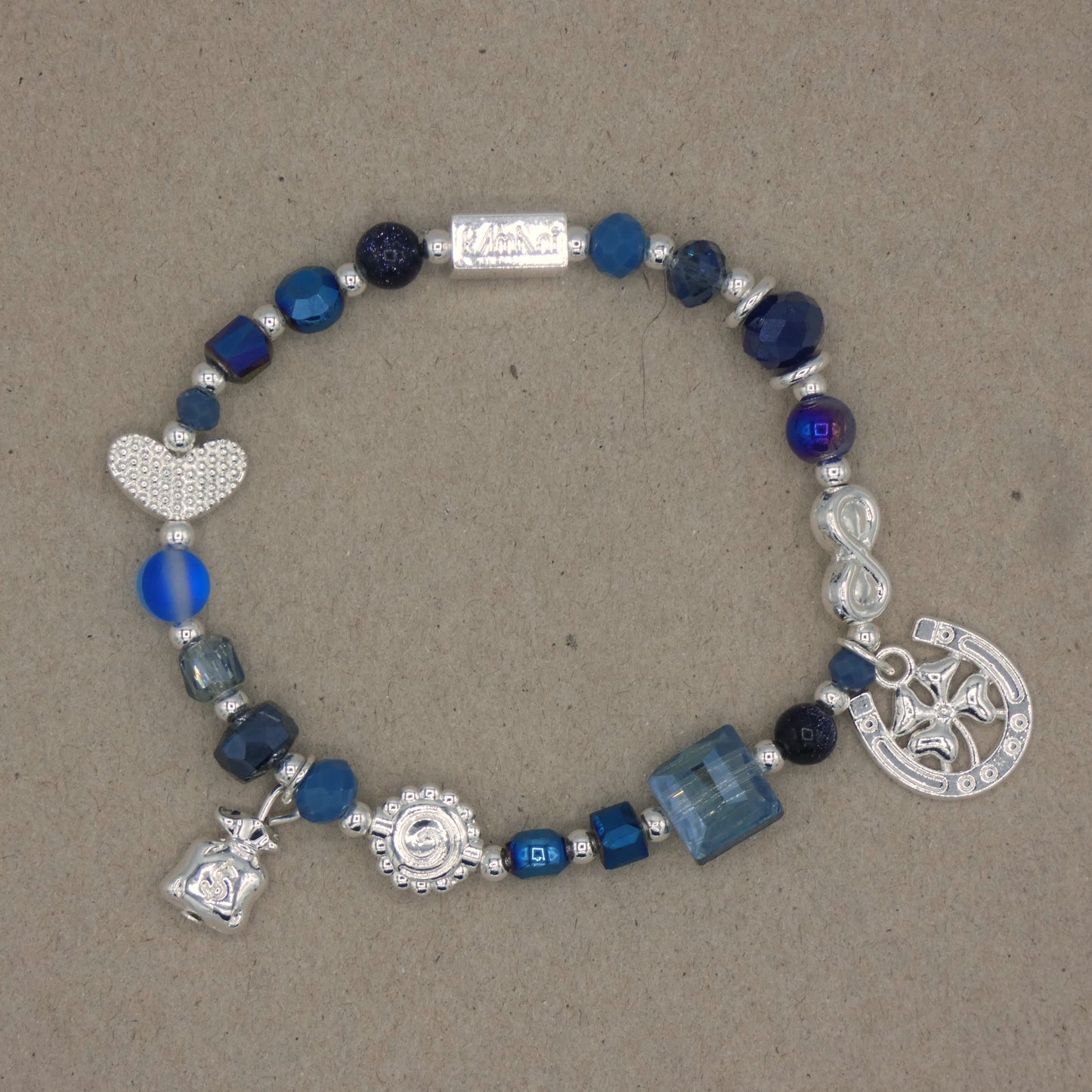 Bracelet avec Charms " Dollars " Collection Bleu des Calanques